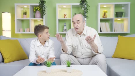 the old man gives islamic education to his grandson.