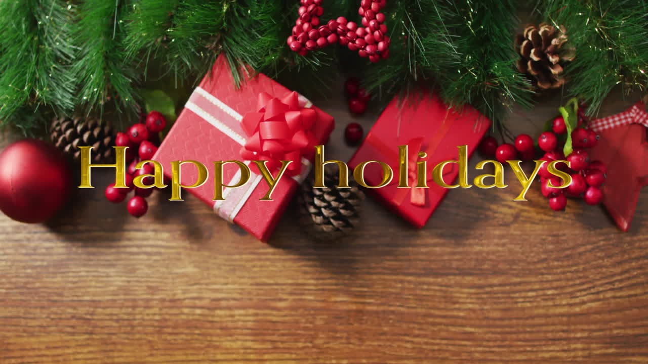 Animation of happy holidays text over presents and christmas decorations