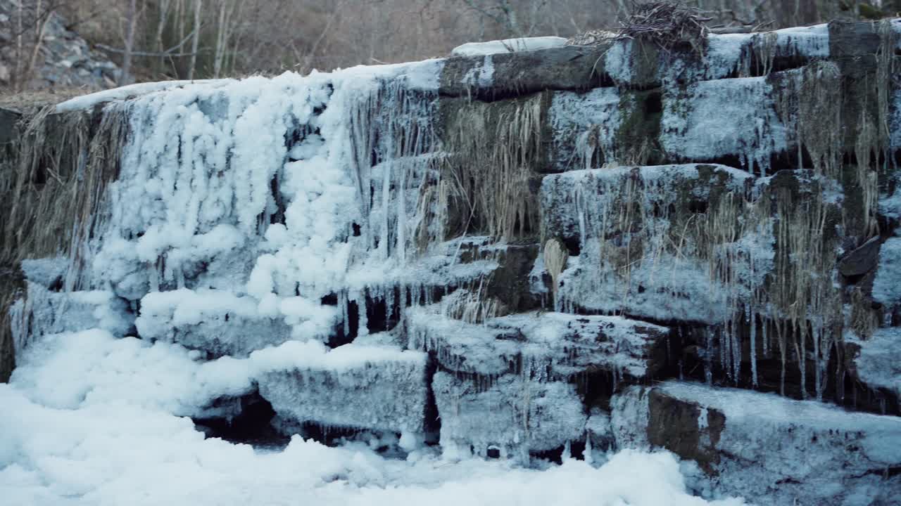 Snow-Covered Stone Barrier In The Unused Old Dam