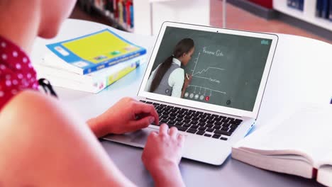 Caucasian-female-student-using-laptop-on-video-call-with-female-teacher