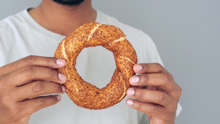 Simit Being Held