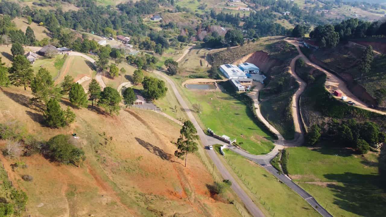 A breathtaking drone flyover of the Valley of a 1000 Hills in KZN, South Africa. Rolling green hills into the horizon, showcasing natural beauty. Ideal for travel, nature, and documentary content