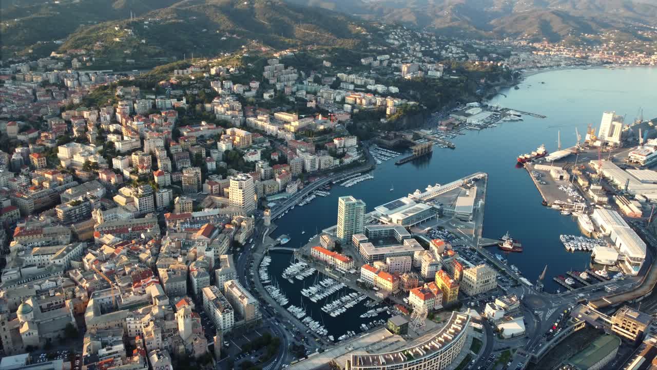 Aerial view of Genoa cityscape with harbor