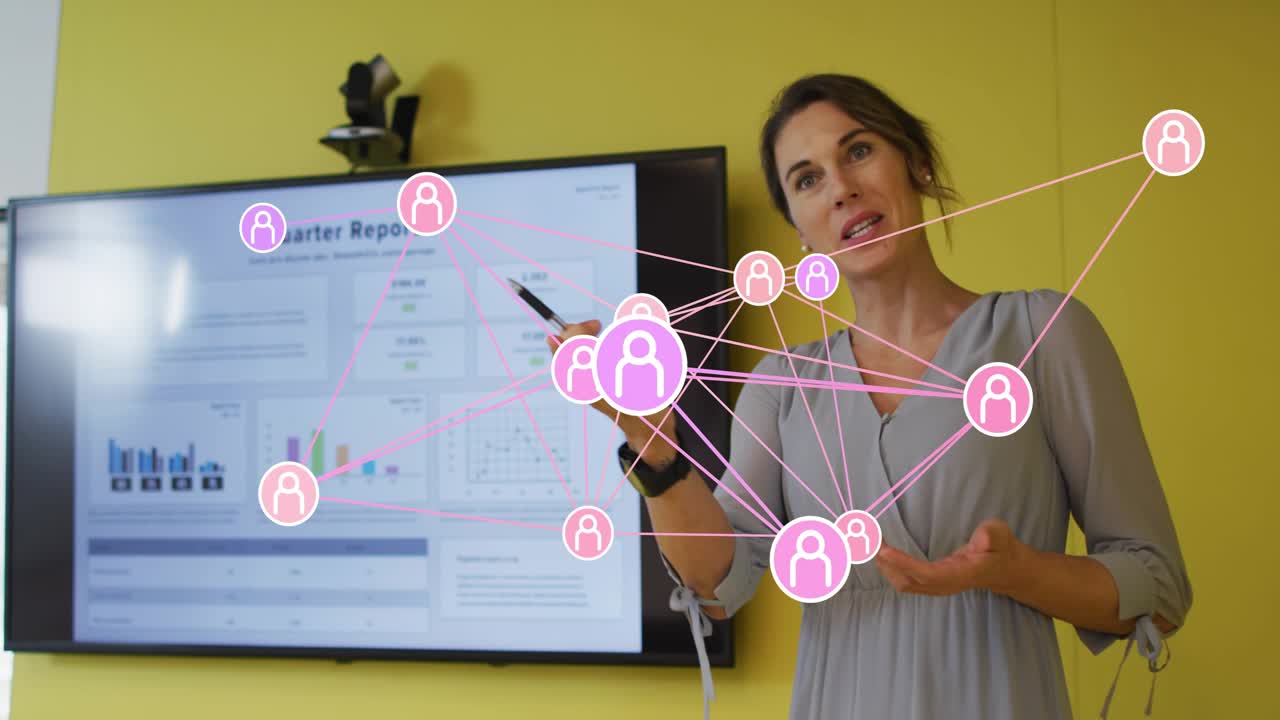 Female presenter pointing pen at display, moving pink network icons and explaining quarter report