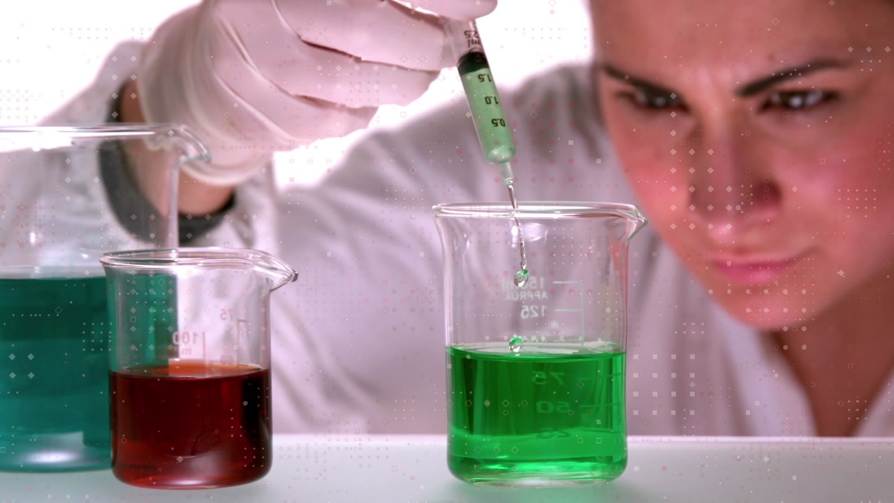 Animation of spots over beaker with liquid and female scientist