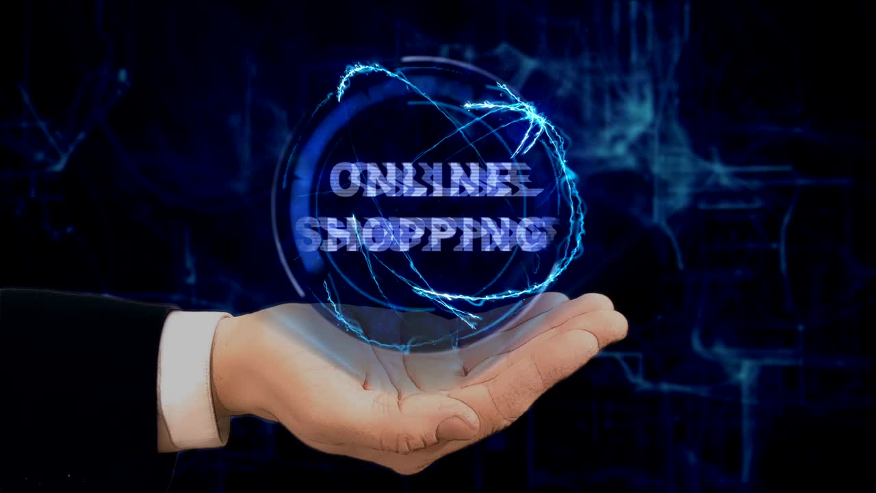 칠한 손은 그의 손에 온라인 쇼핑의 개념 홀로그램을 보여줍니다.