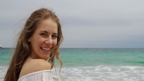 side view of caucasian woman smiling on the beach 4k