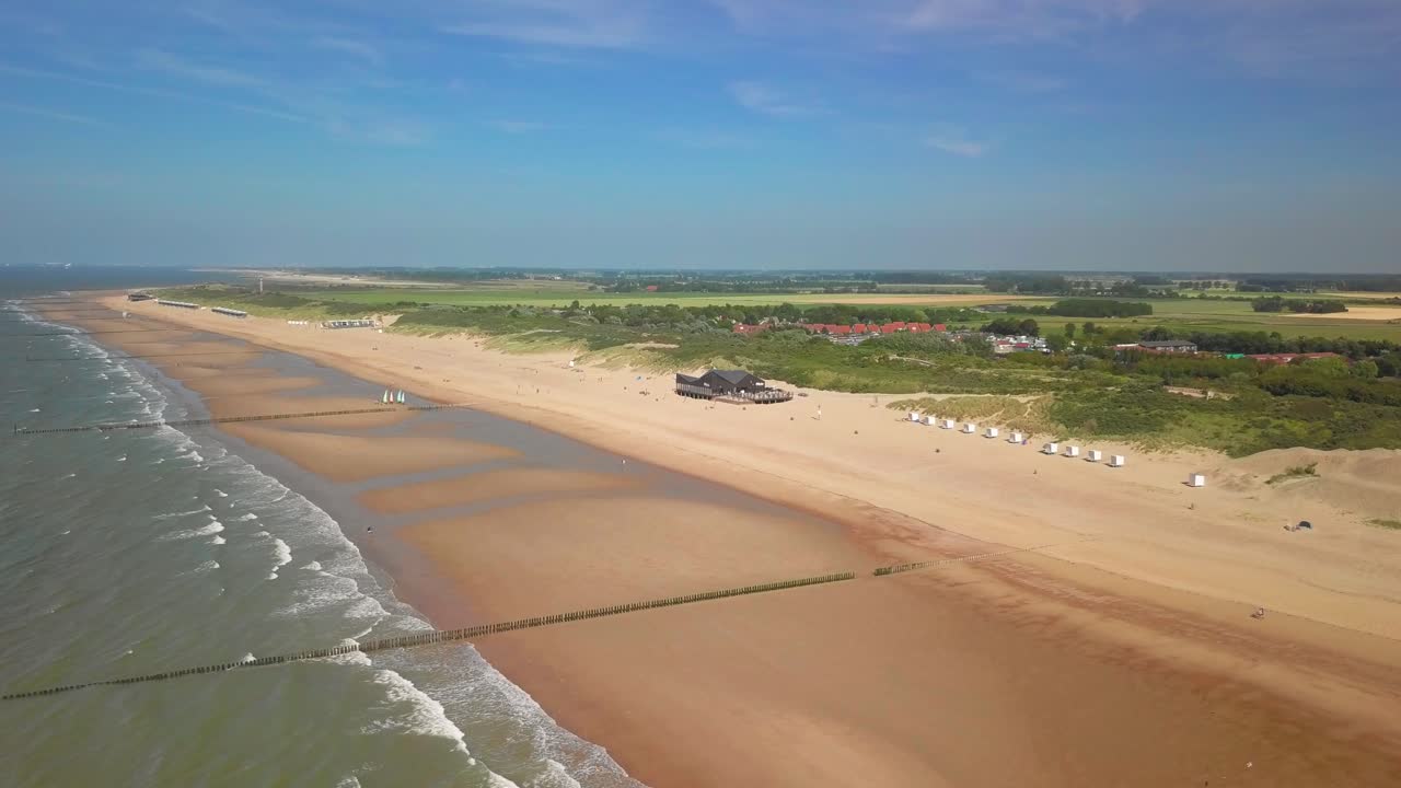 The beach of Cadzand-Bad, the Netherlands during a sunny day. Aerial shot