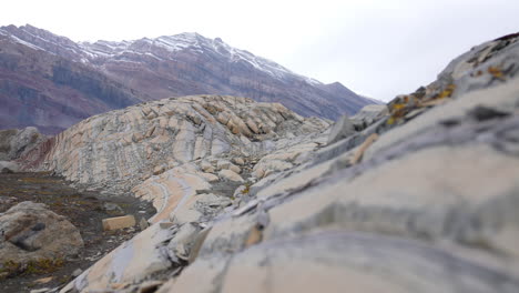 Landscape-of-Greenland-in-Spring-Season,-Limestone-Hills-and-Snow-Capped-Peaks