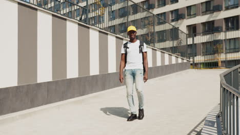 man walking on a city ramp