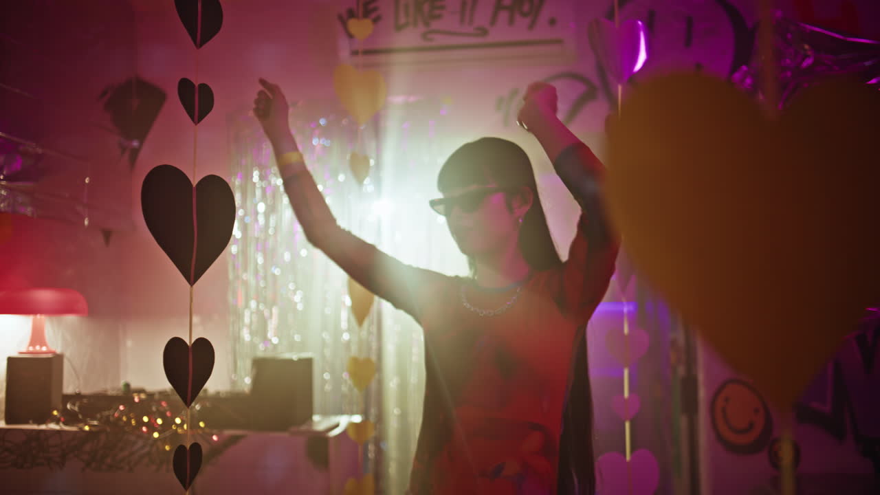 woman dancing neon festive nightclub closeup. Happy dancer lost in music