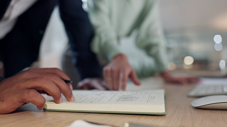 Writing, planning and hands of business people