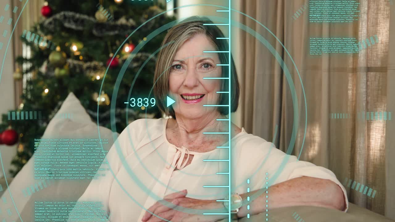 Senior woman lifting arm tucking hair, smiling laughing while HUD animating for holiday tech