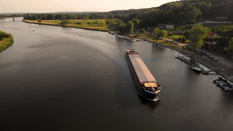 bulk carrier ship cruising in west oder river in szczecin poland