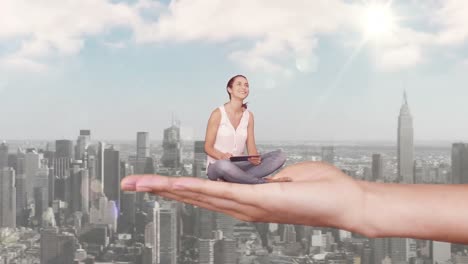 Hand-holding-sitting-casual-woman-focused-on-tablet-computer-above-scyscrapers