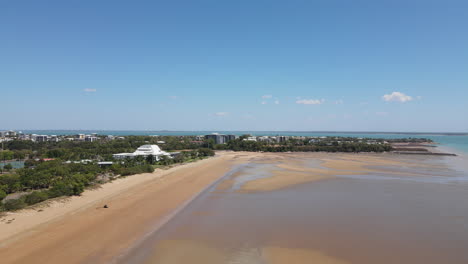 distant slow moving aerial drone shot of mindil beach, darwin, northern territory