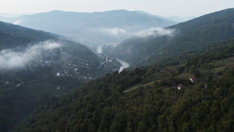 magical flight over beautiful balkan valley with cute bosnian houses