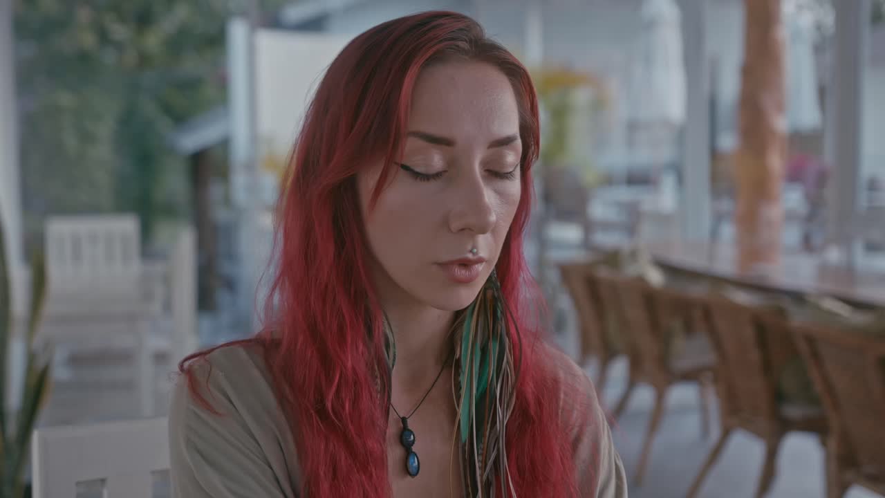 Woman with Red Hair and Closed Eyes