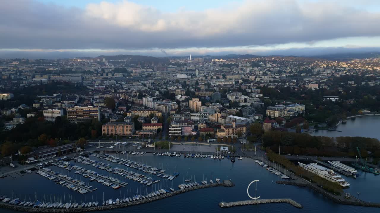 Jib drone shot of Eole Sculpture and Ouchy Port in Lausanne Switzerland