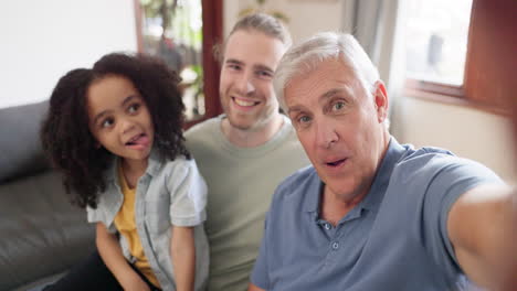 Grandfather,-father-and-child-take-a-funny-selfie
