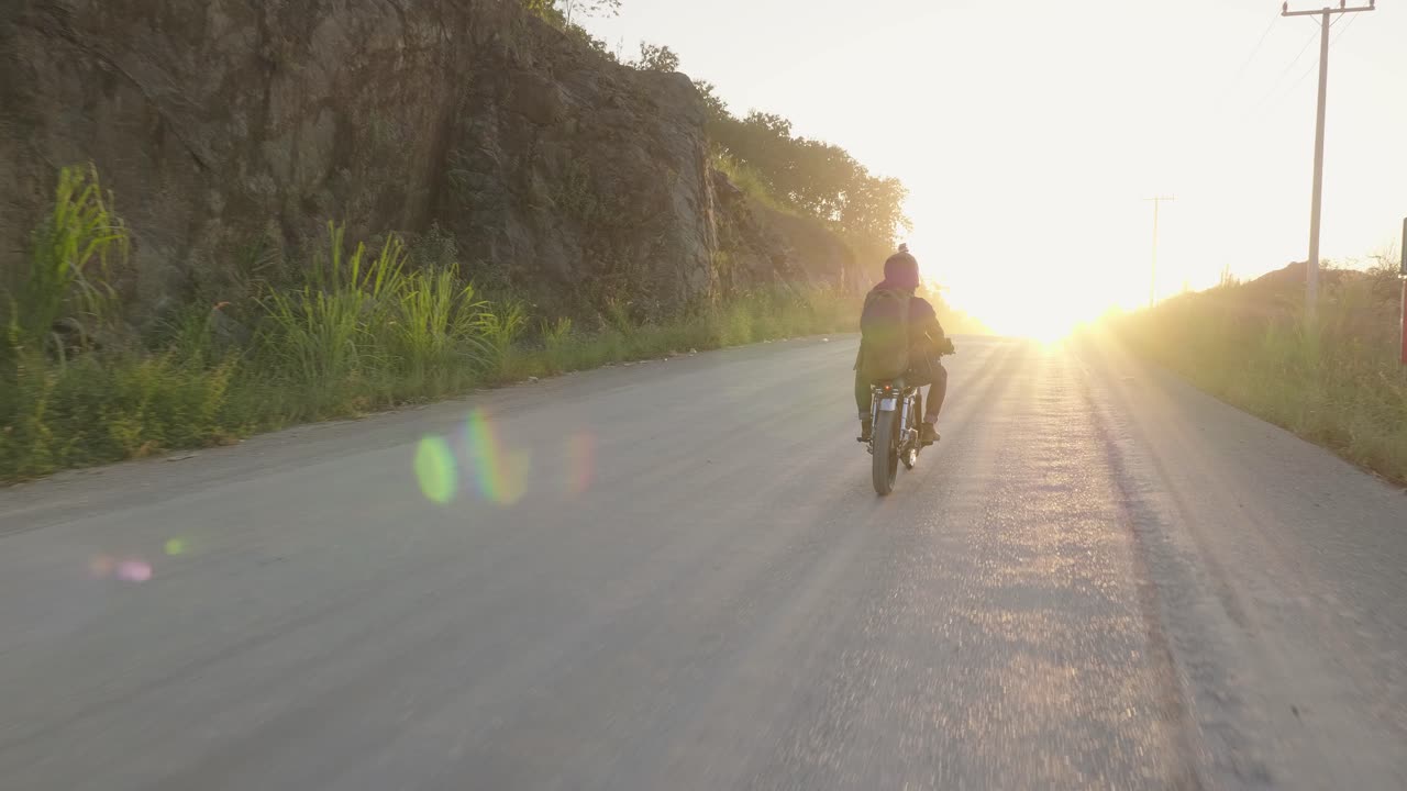 Motorcycle Ride at Sunset on a Country Road