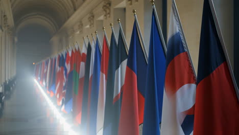 row of international flags in a hallway