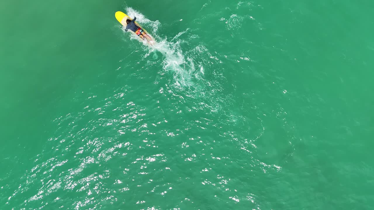 Surfing in the ocean