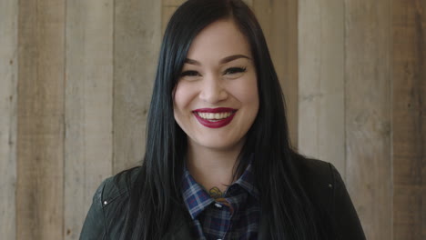 portrait of young lively caucasian woman smiling cheerful looking at camera enjoying  independent lifestyle