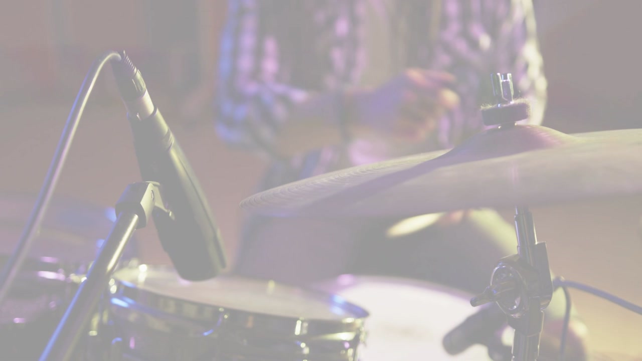 Vertical video: Studio drummer playing, camera showing snare, hands hitting cymbal, mics for mixing