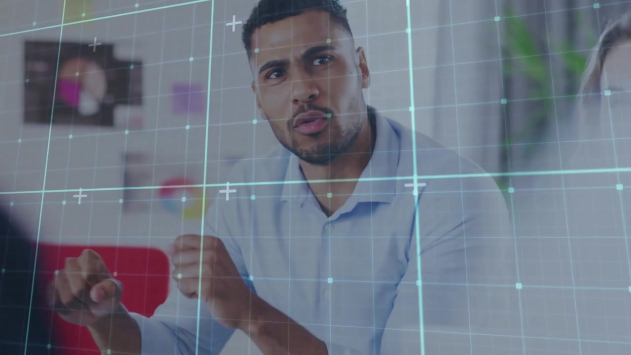 Translucent grid overlay sweeping across view causing man gesturing to show business data insights