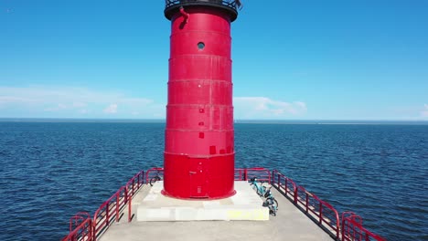 red lighthouse on a pier
