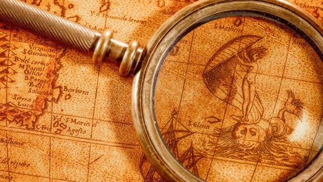 vintage magnifying glass lies on an ancient world map in 1565