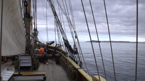 1700s sailing ship underway at sunrise