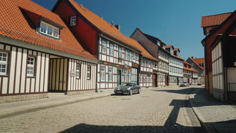 modern car in old fashioned street