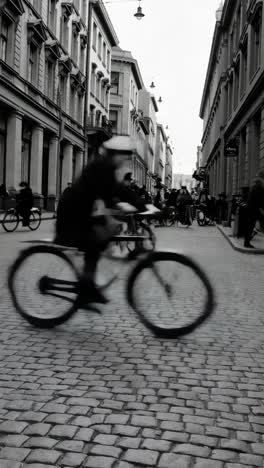 cyclists riding through a city on cobblestone streets