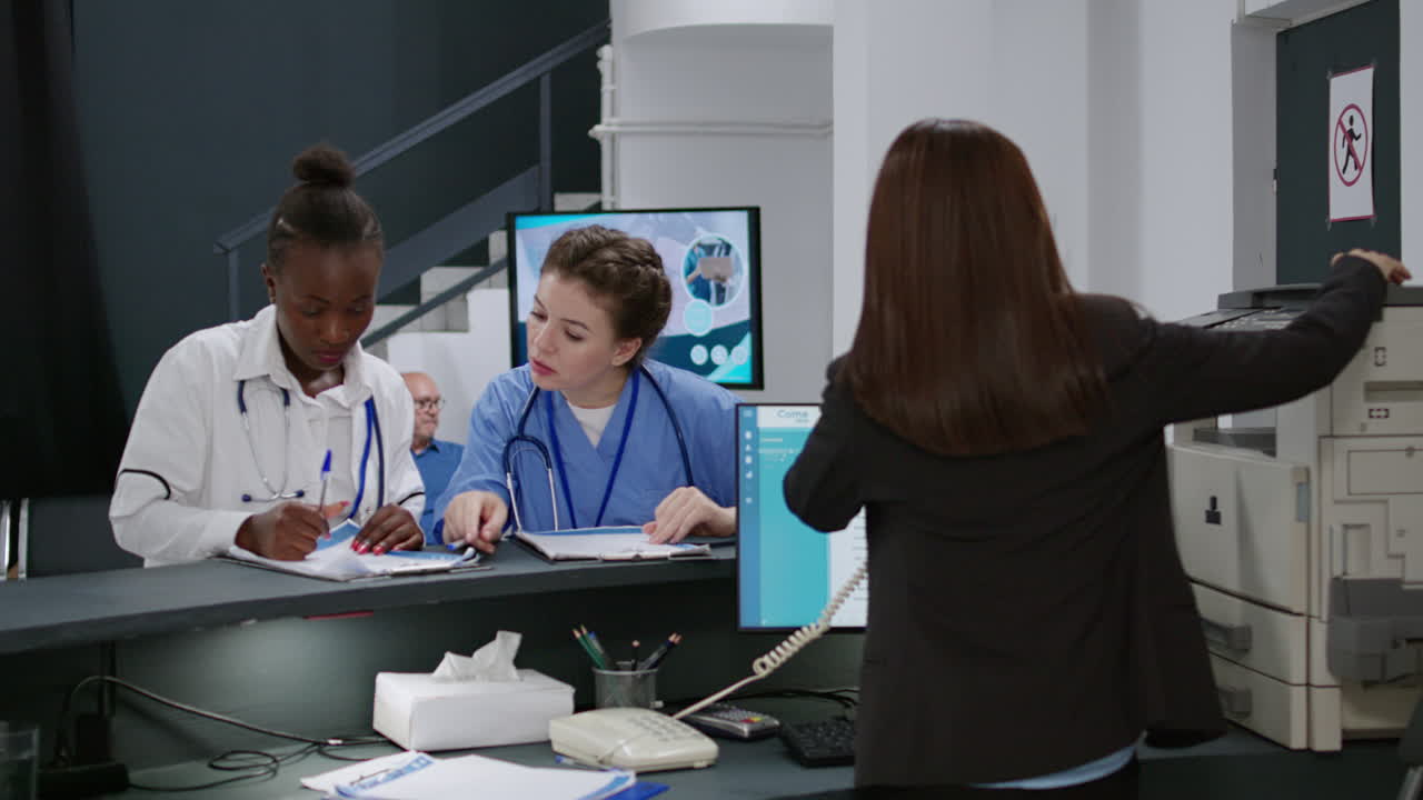 Hospital reception with doctors and receptionist