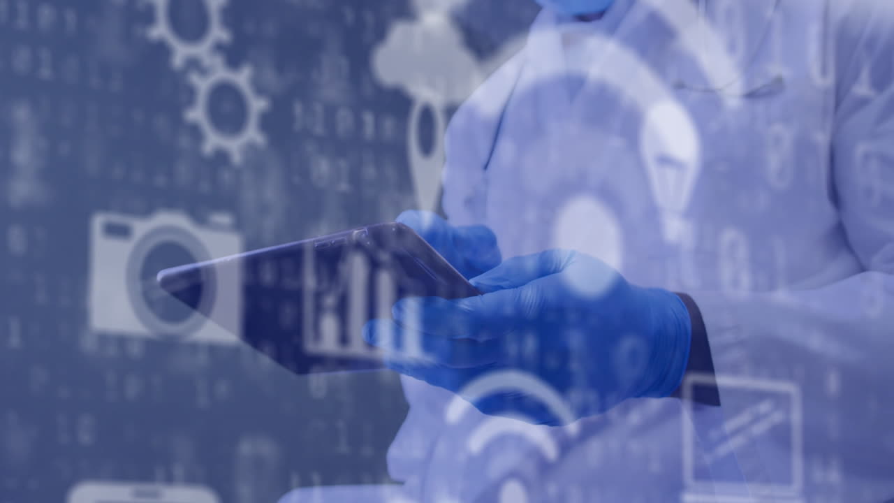 얼굴 마스크를 쓰고 메모를 하는 아프리카계 미국인 남성 의사의 중간 부분에 있는 기술 아이콘의 애니메이션