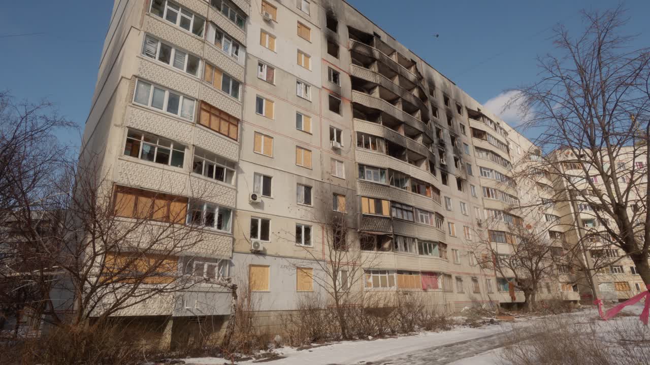 Terraced residential building damaged by war operations in Ukraine