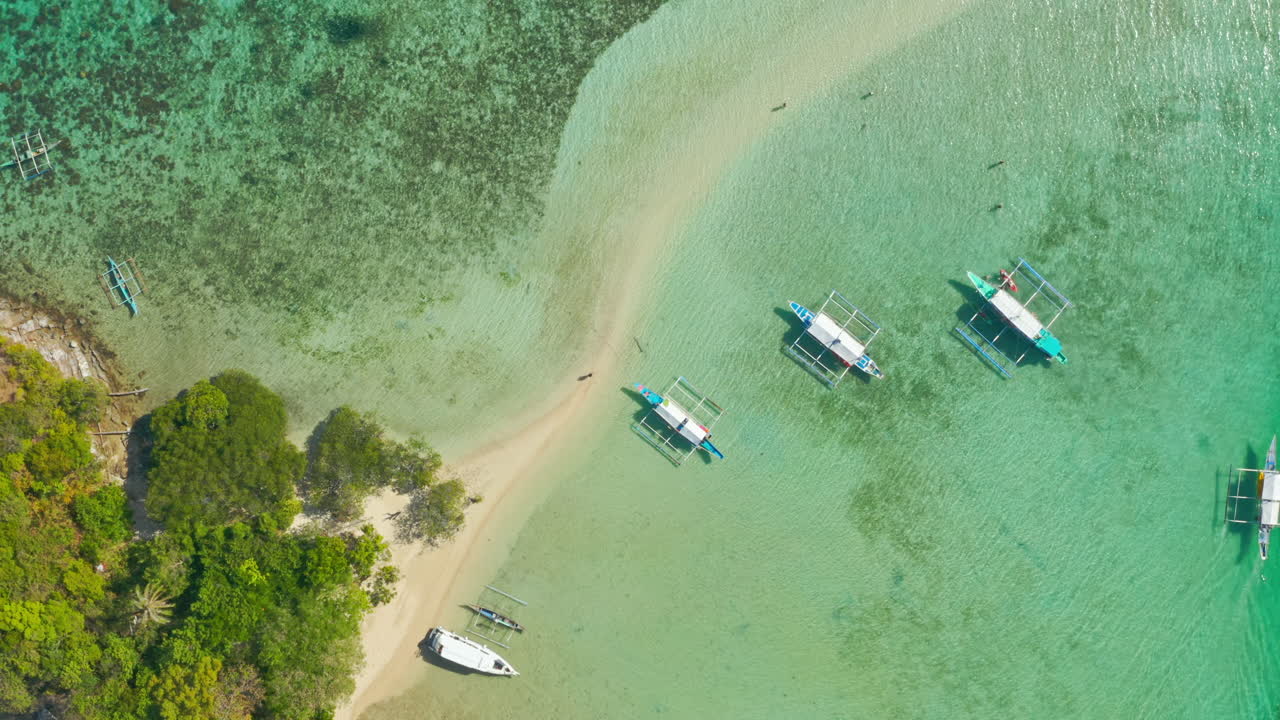 Aerial View of Tropical Bay with Clear Turquoise Water and Boats