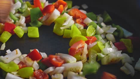 sauteing bell pepper and onion in pan