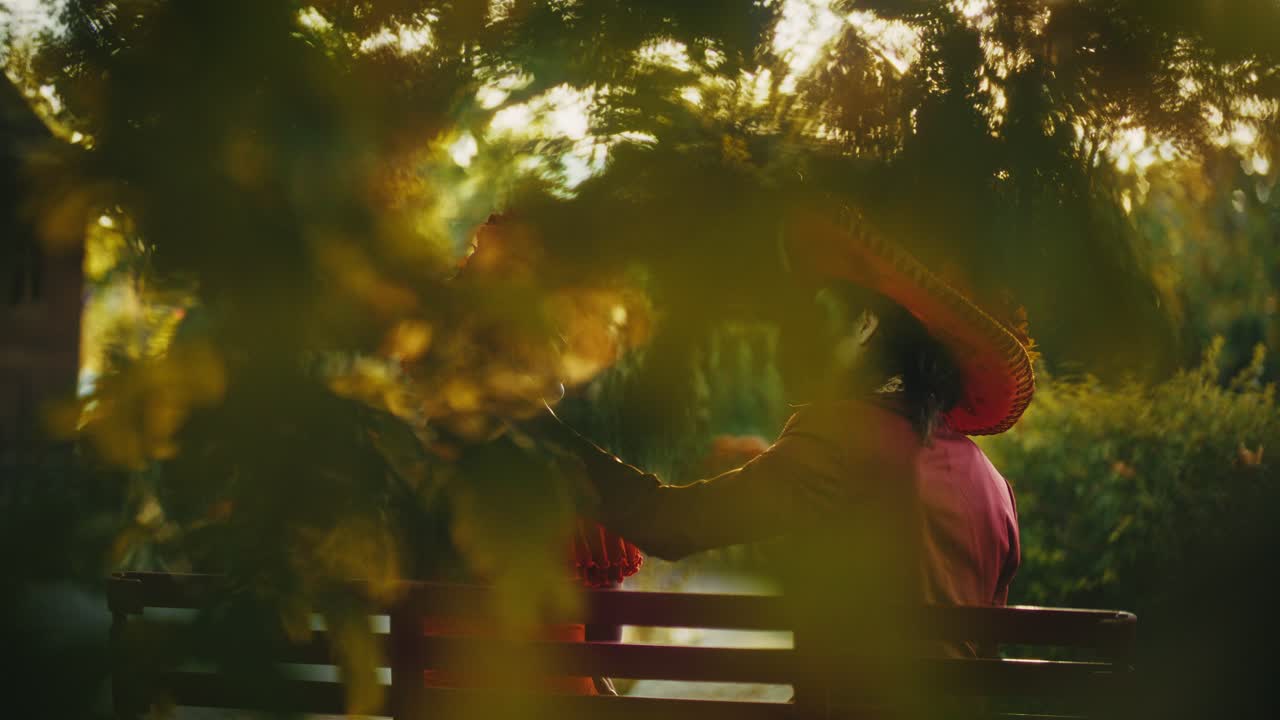Couple in Park with Festive Hats