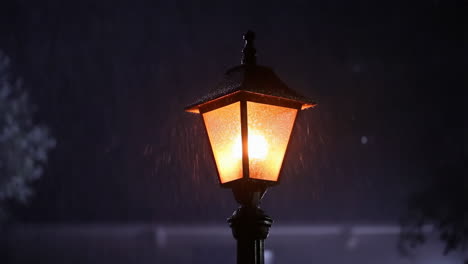 street lamp at night in the rain
