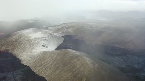 Aerial-Over-Snow-Covered-Lava-Flows-At-The-Fagradalsfjall-Volcano-On-The-Reykjanes-Peninsula,-Iceland