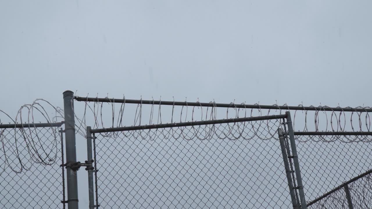 Prison Gate Closes in Slow Motion in Snow