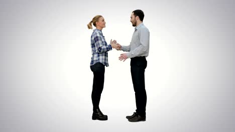 young people happy to meet each other handshaking on white background