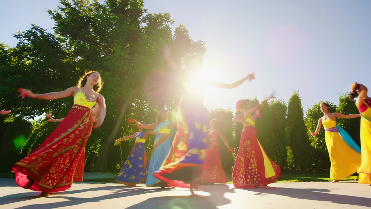Group of Women Dancing in Colorful Traditional Attire