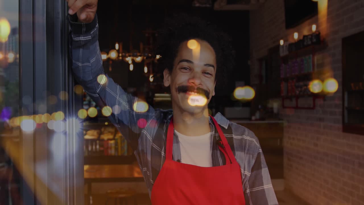 Animazione di punti luce su un uomo che lavora in un bar.