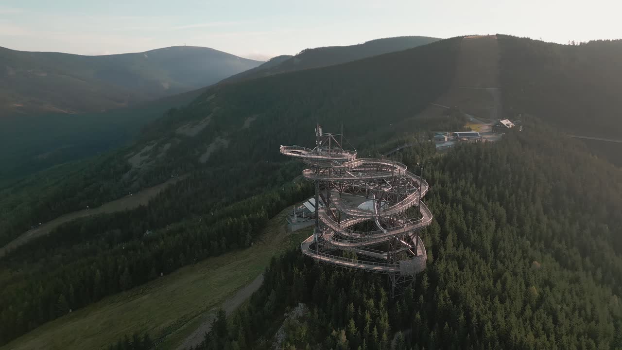 Trail in the clouds in Lower Moravia bathed in the rays of the rising sun