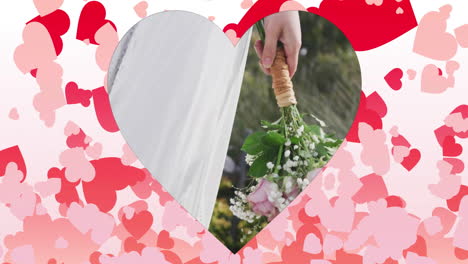 heart-shaped animation with pink and red hearts over bride holding wedding bouquet