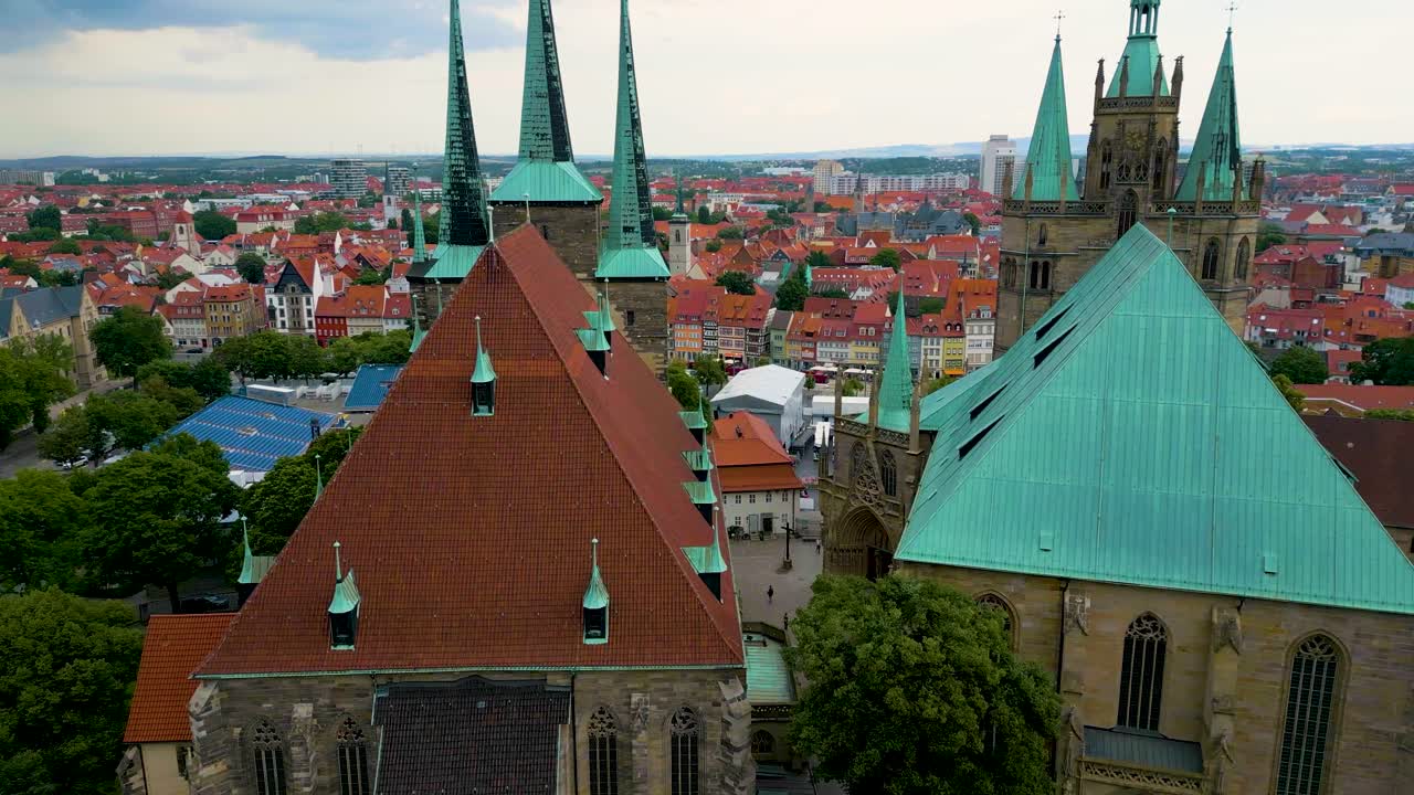4K Aerial Drone Video of Beautiful Gothic St. Severi Church and Erfurt Cathedral overlooking the Town Square of Erfurt, Germany